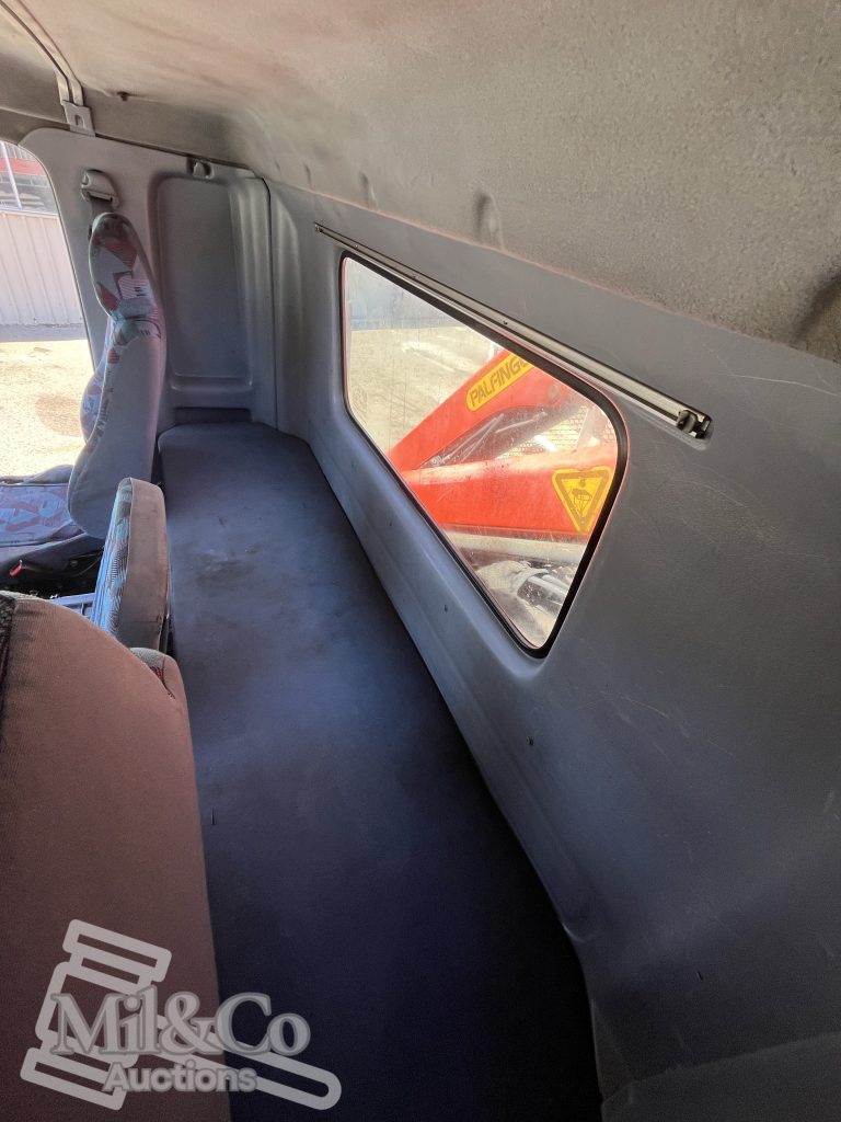 2005 Hino Ranger Tray Back Truck with Crane interior behind seats