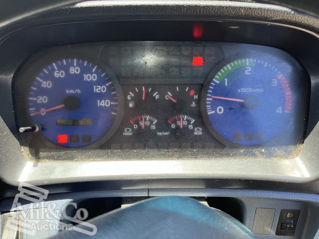 2005 Hino Ranger Tray Back Truck with Crane instrument cluster showing 86160 kilometres
