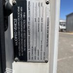 2005 Hino Ranger Tray Back Truck with Crane vehicle modification plate